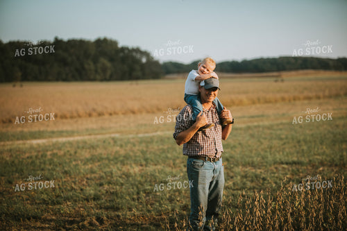Farmer with Toddler on Shoulders 4812