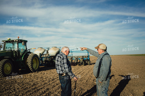 2 Generations of Farmers in Field at Planting 4231