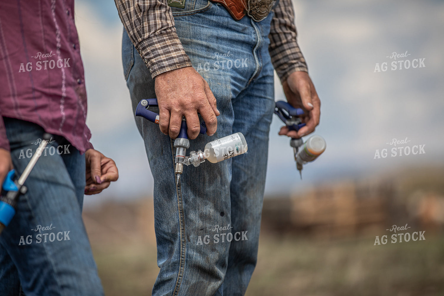 Rancher with Vaccine Guns 304009