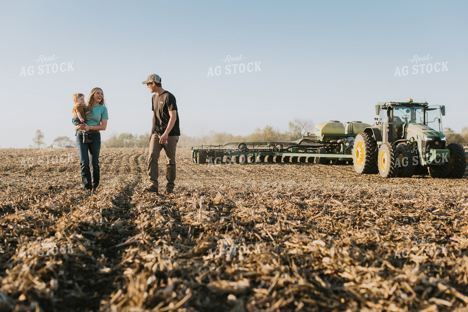 Young Couple with Child Walk Away from Tractor 7672