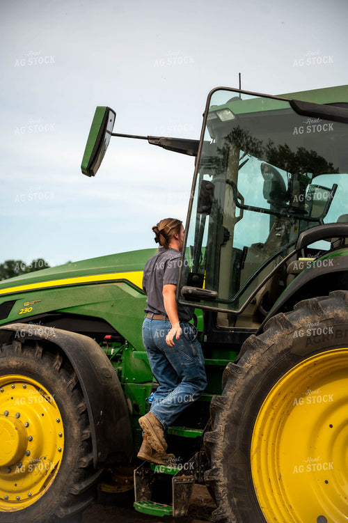 Female Farmer Walking by Planter 115652