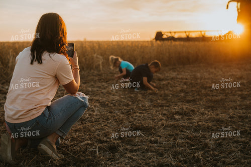 Mother Taking Photos of Farm Kids in Soybean Field 6988