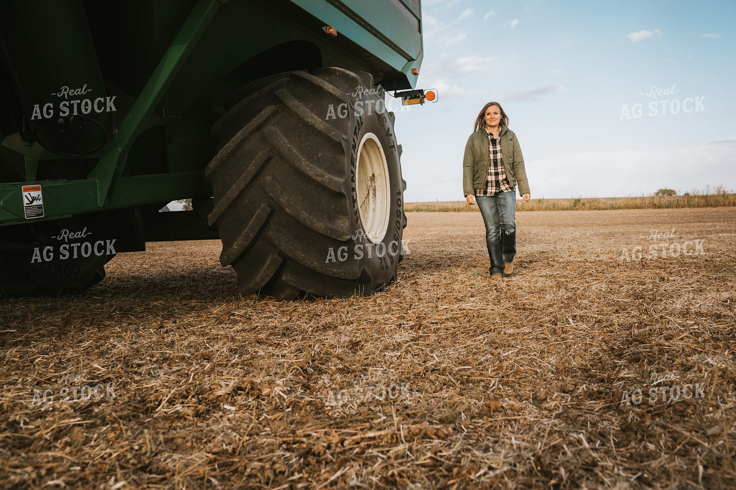 Female Farmer with Grain Cart 3513