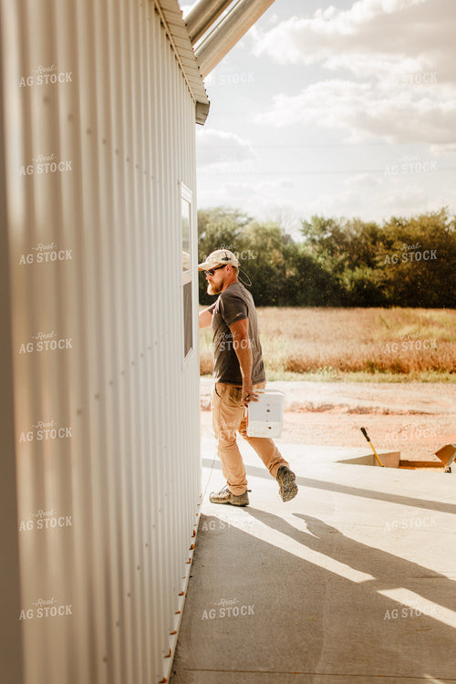 Farmer Checking Moisture of Stored Corn 9323
