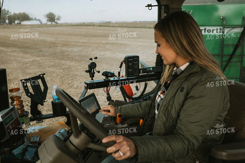 Female Farmer in Tractor with Grain Cart 3502