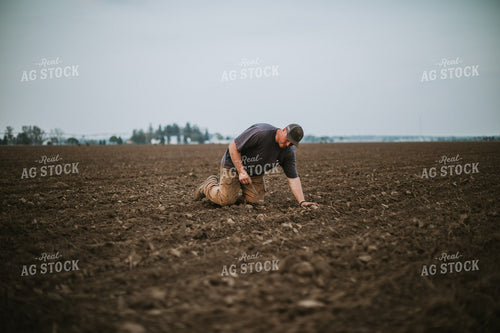 Farmer Checking Seed Depth 5676