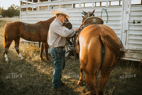 Rancher and Horse Near Livestock Trailer 6423