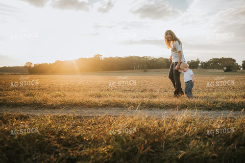 Farmer and Farm Kid Walking to Truck 4876