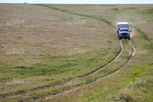 Truck and Trailer Driving on Dirt Road 260010