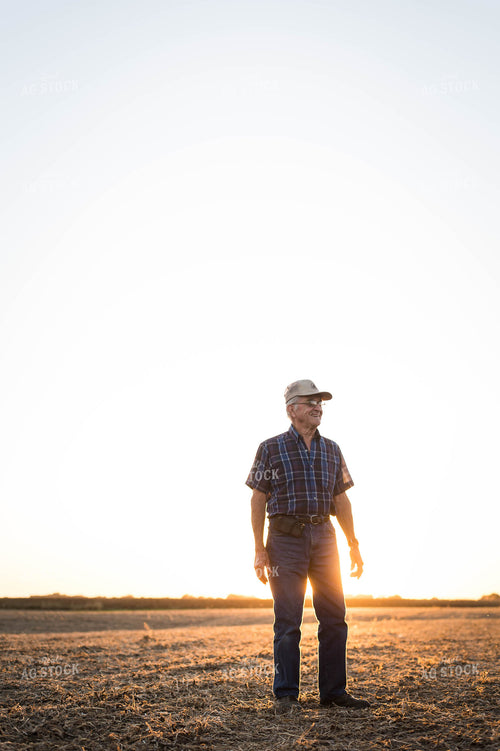 Farmer Standing in Field 115032