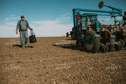 Farmer Climbing out of Tractor with Lunch Box 4104
