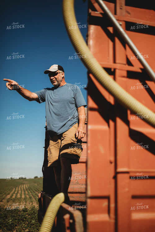 Farmer in Tandem Water Truck Filling Sprayer 4378