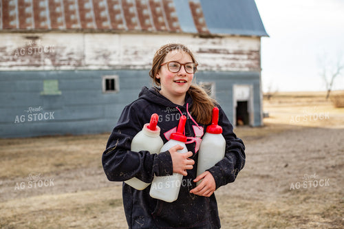 Farm Kid Carrying Calf Bottles 155383