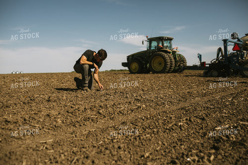Farmer Checking Seed Depth 4107