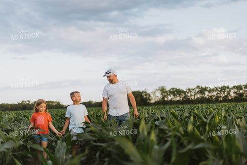 Farmer and Kids Checking Corn 8791