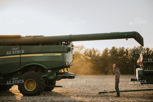 Farmer with Combine and Head 6742