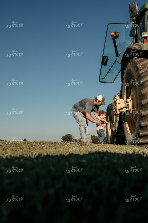 Farmer and Child with Tractor 3151