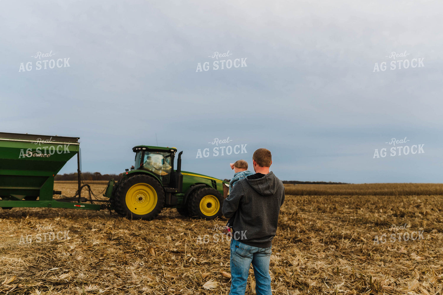 Farmer Holding Kid 115159