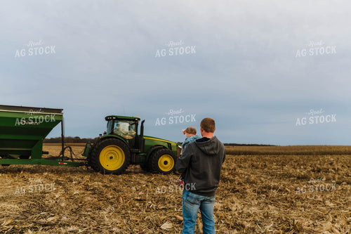 Farmer Holding Kid 115159