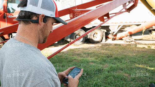 Farmer Using Phone 26088