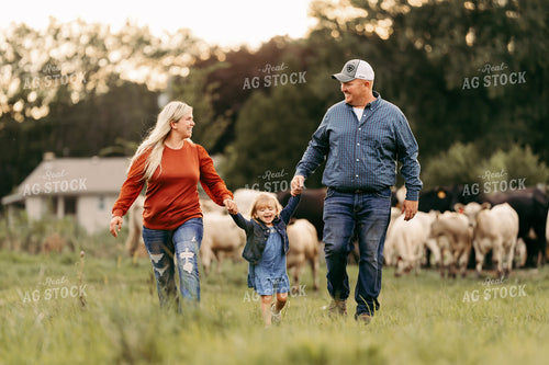 Family Walking in Cattle Pasture 68241