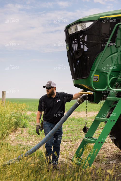 Applicator Filling Sprayer in Field 8007