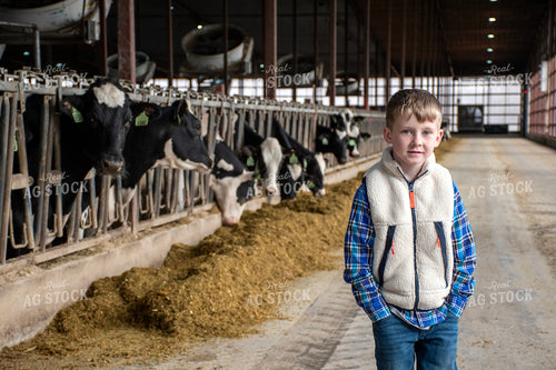 Farm Kid in Dairy Barn Alley 271037