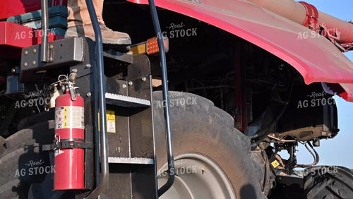 Farmer Climbing off Combine - 431