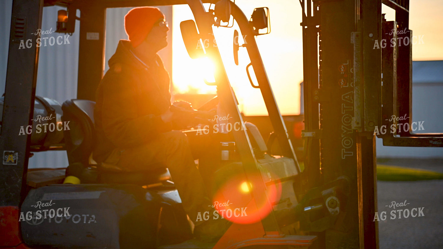 Loading the Seed Tender with the Skidsteer 25327
