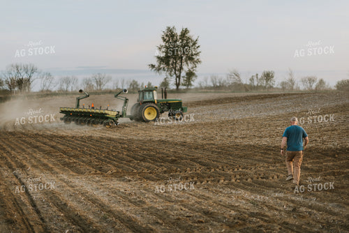 Farmer Walking Towards Planter 7461