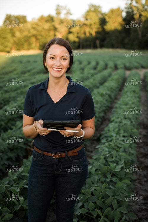 Agronomist or Farmer in Soybean Field with Tablet 6097
