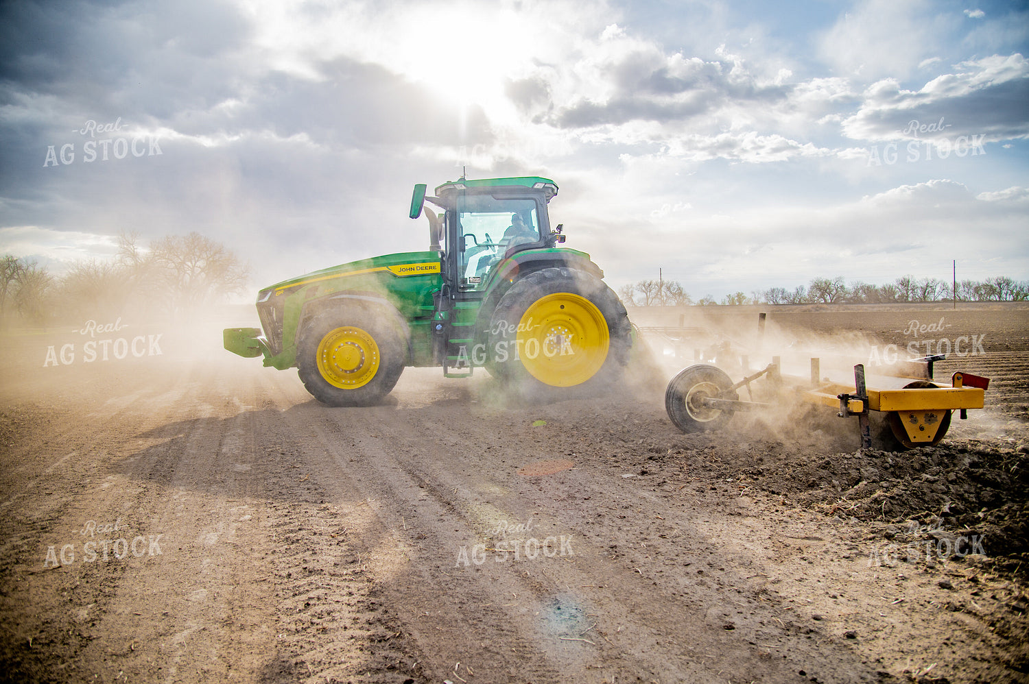 Tractor Rolls Field 56648
