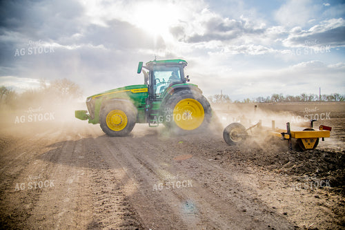 Tractor Rolls Field 56648