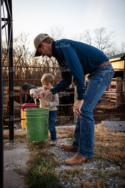 Farmer and Son Doing Chores 268127