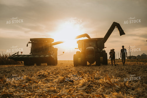 Family by Combine and Auger Cart at Sunset 5267