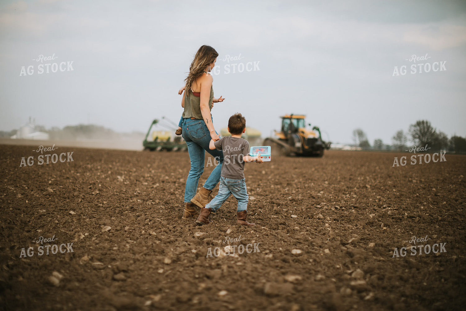 Farm Mom Taking Kids Out to Tractor During Planting 5635