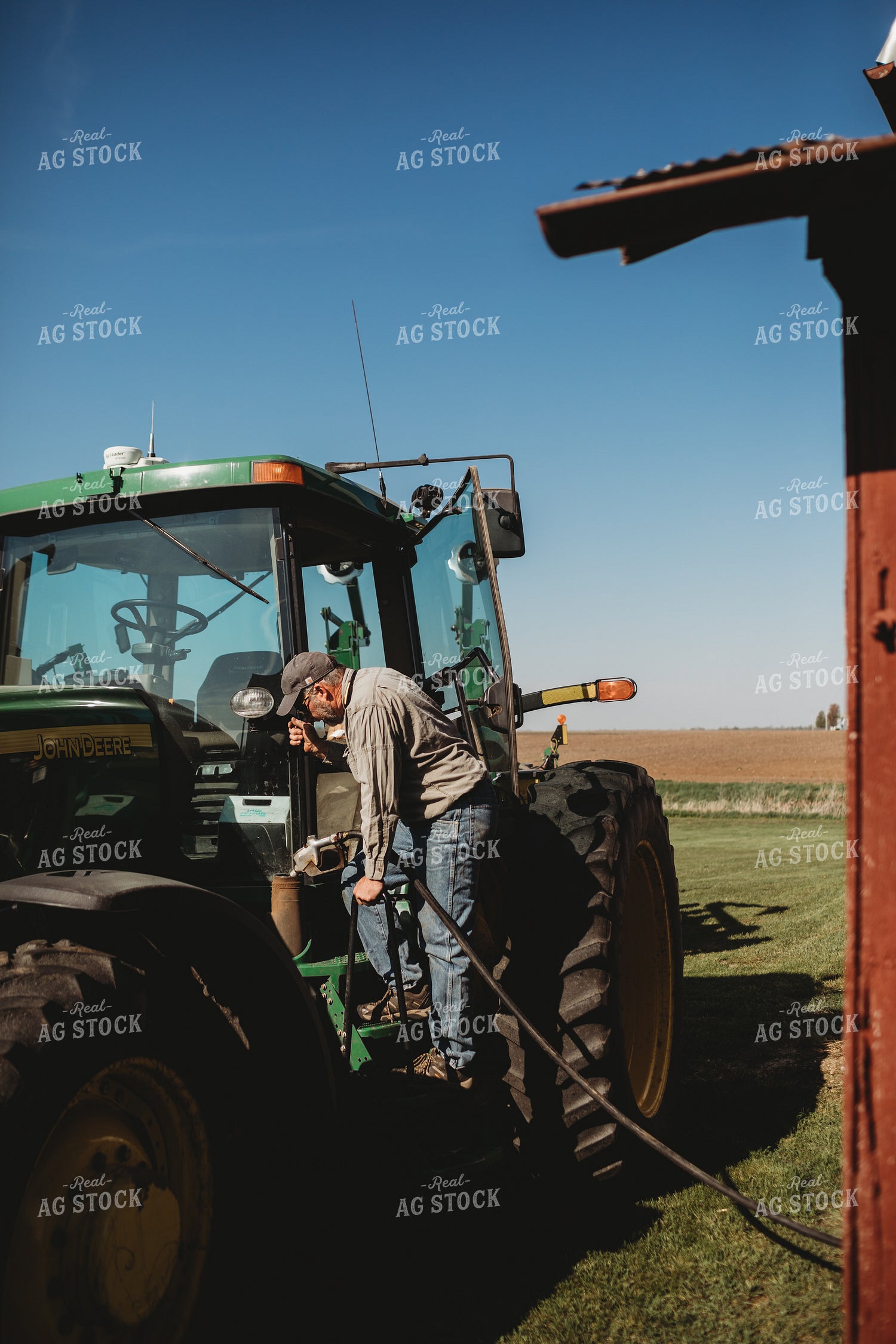 Farmer Fueling Up Tractor 4092