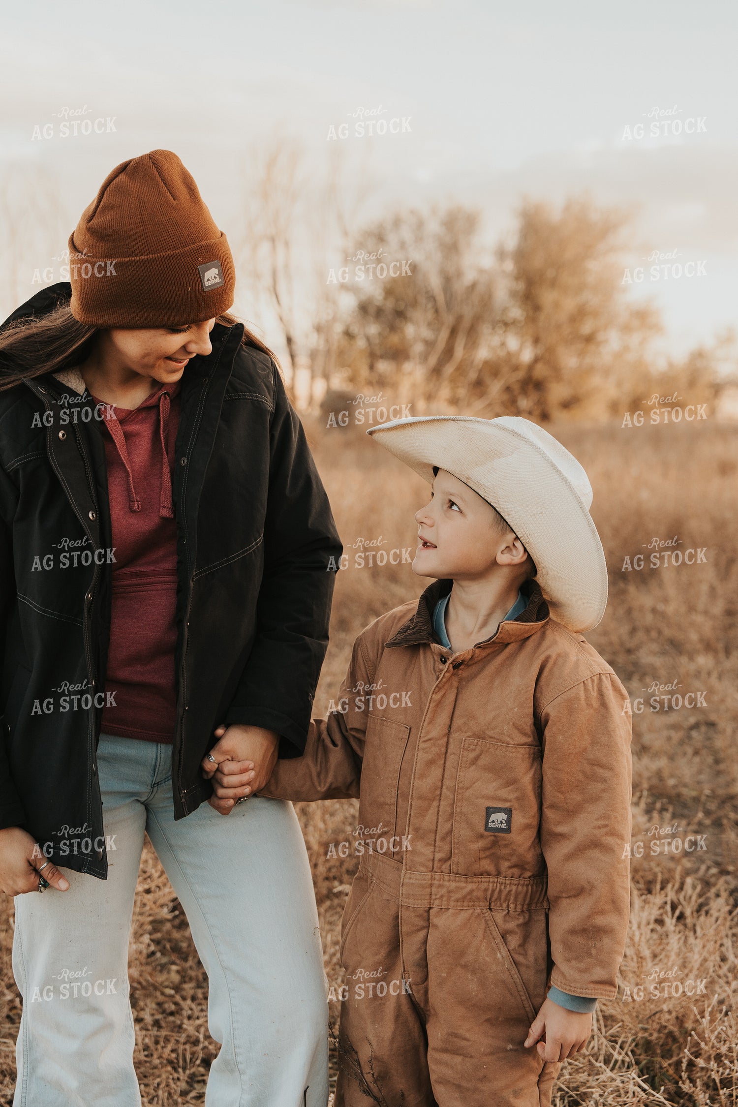 Female Rancher and Kid 61248