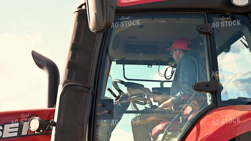 Farmer in Tractor Cab 25229