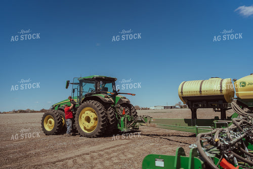 Farm Kid Helps with Test Plot 196130