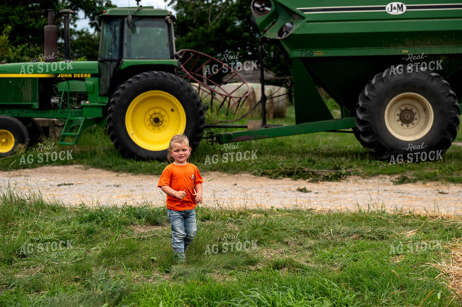 Farm Kid Walking by Tractor 115817