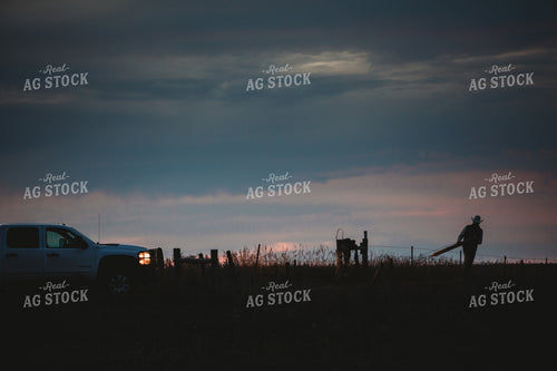 Rancher Working in Pasture at Dusk 6438