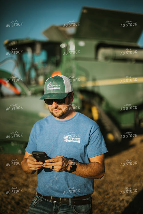 Farmer on Phone in Field 7132