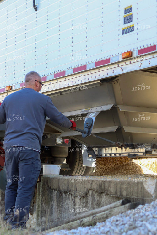 Farmer Unloading Semi 109025