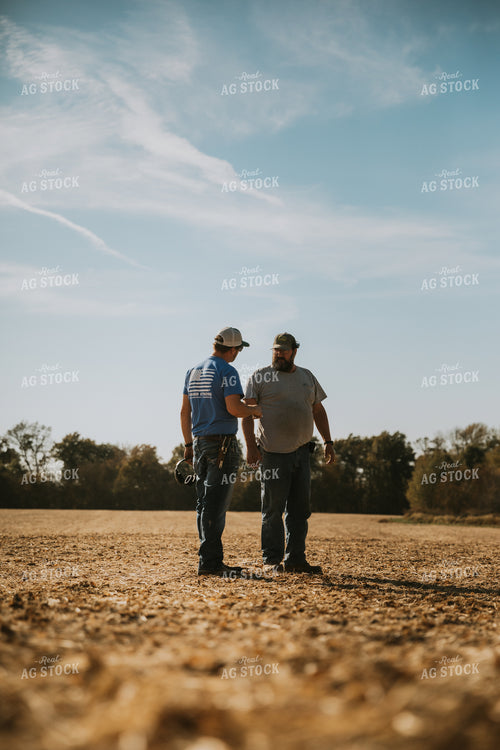 Farmers Talking in Field 7080