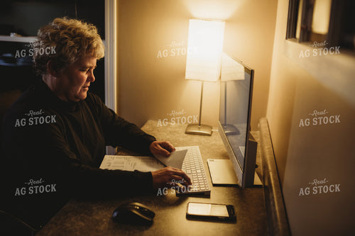 Farmer Using Computer for Farm Accounting 3710