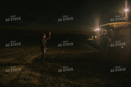 Farm Mom Taking Son To Ride in Tractor at Night 5162