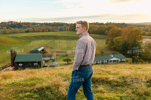 Farmer Overlooking Farm on Hill 52652