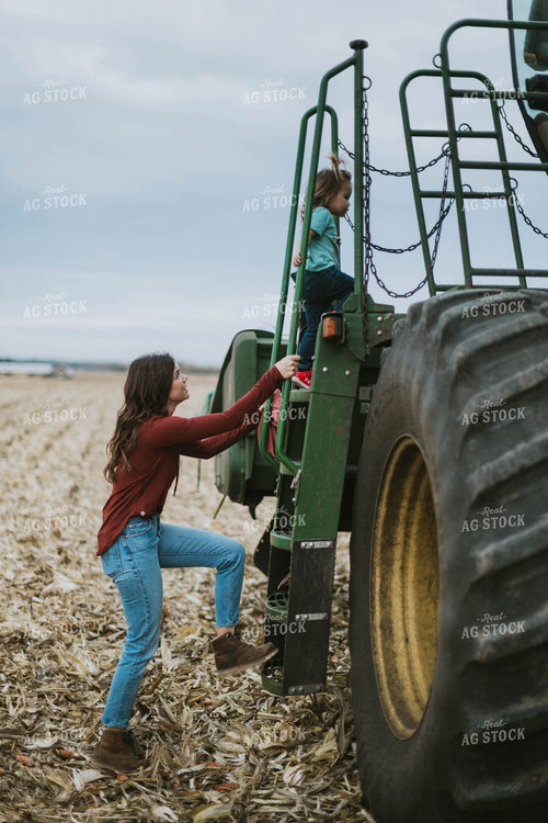 Farm Family Loading Kids into Combine 8628