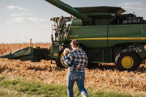 Farm Family Climbing into Combine 115358
